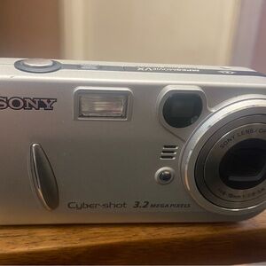 Sony Cyber-shot 3.2 MP Digital Camera - Silver with Blue Strap